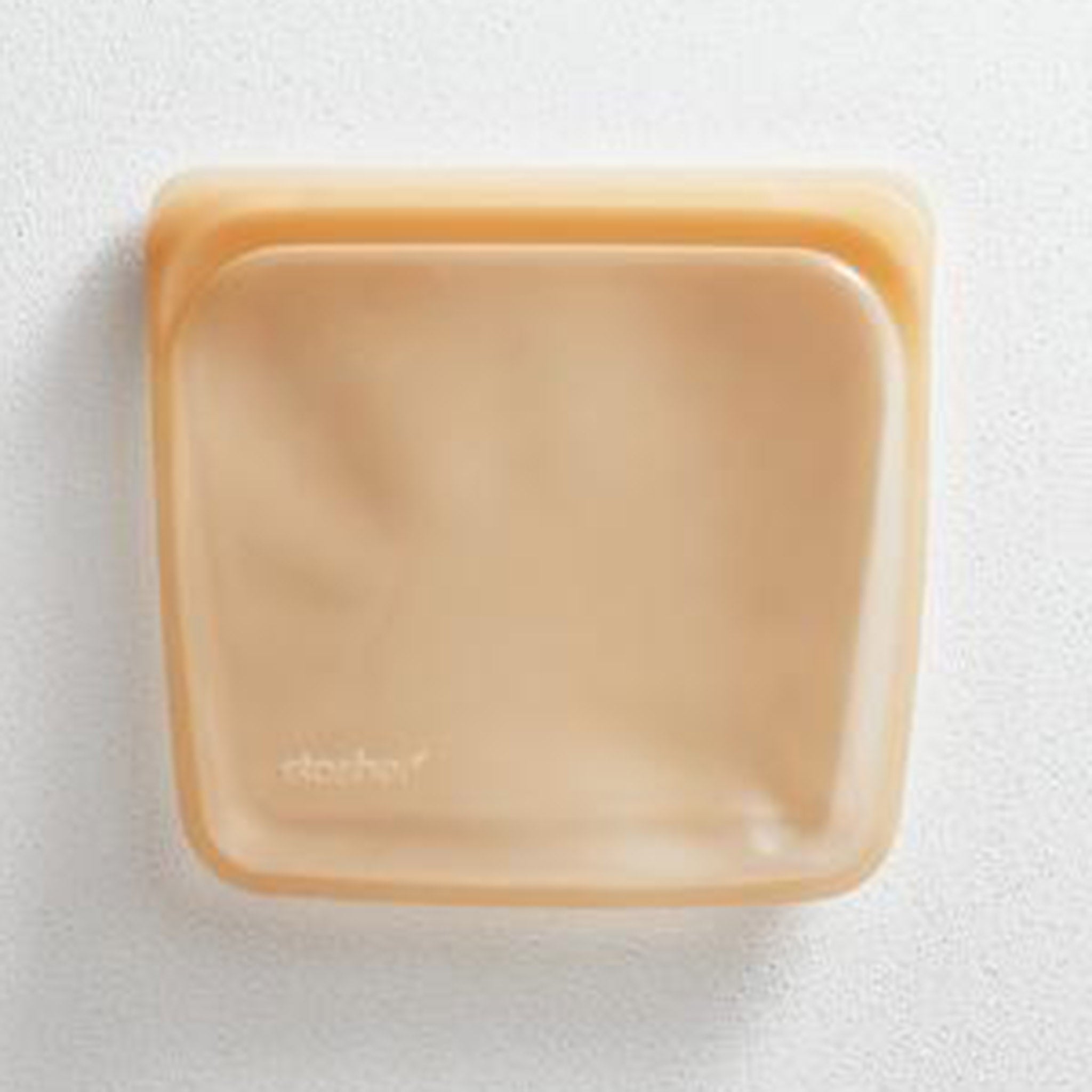 https://blueribbongeneralstore.com/cdn/shop/products/stasher-sandwich-size-reusable-silicone-storage-bag-rainbow-orange-empty.jpg?v=1674077772