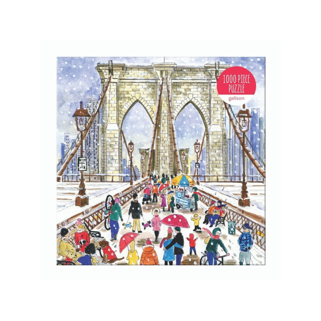 Front of jigsaw puzzle box with illustration of people walking across the brooklyn bridge in snow.