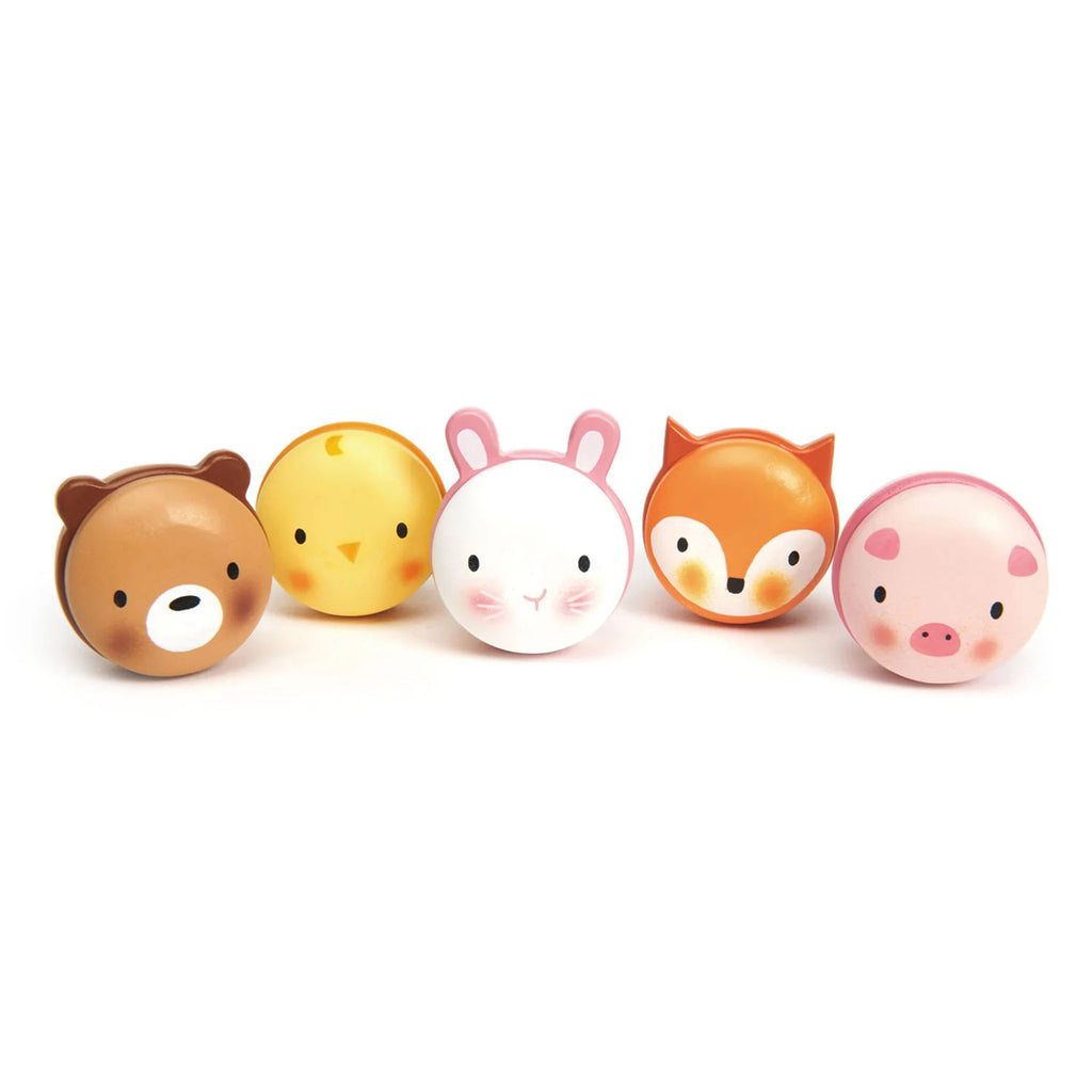 Painted wooden animal macarons set with a bear, chick, bunny, fox and pig all standing up, front view.