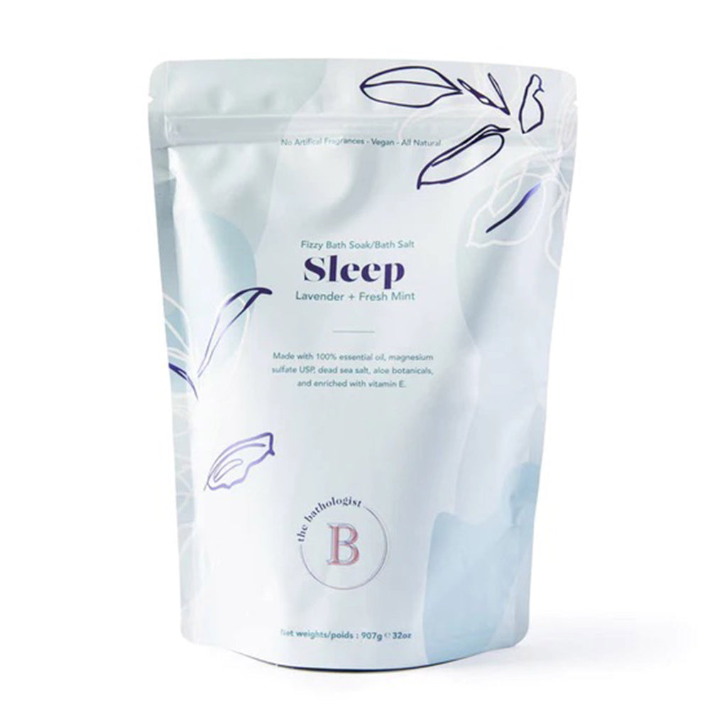 The Bathologist Sleep Lavender and Fresh Mint Scented Fizzy Bath Soak in light blue resealable pouch, front view.