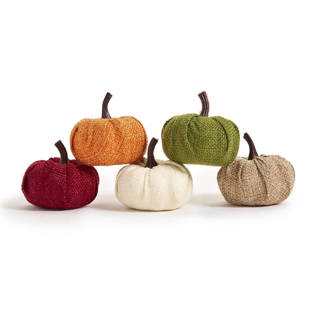 Little styrofoam pumpkins with brown plastic stems wrapped in red, orange, white, green or tan fabric, stacked with 3 on the bottom and 2 on top.